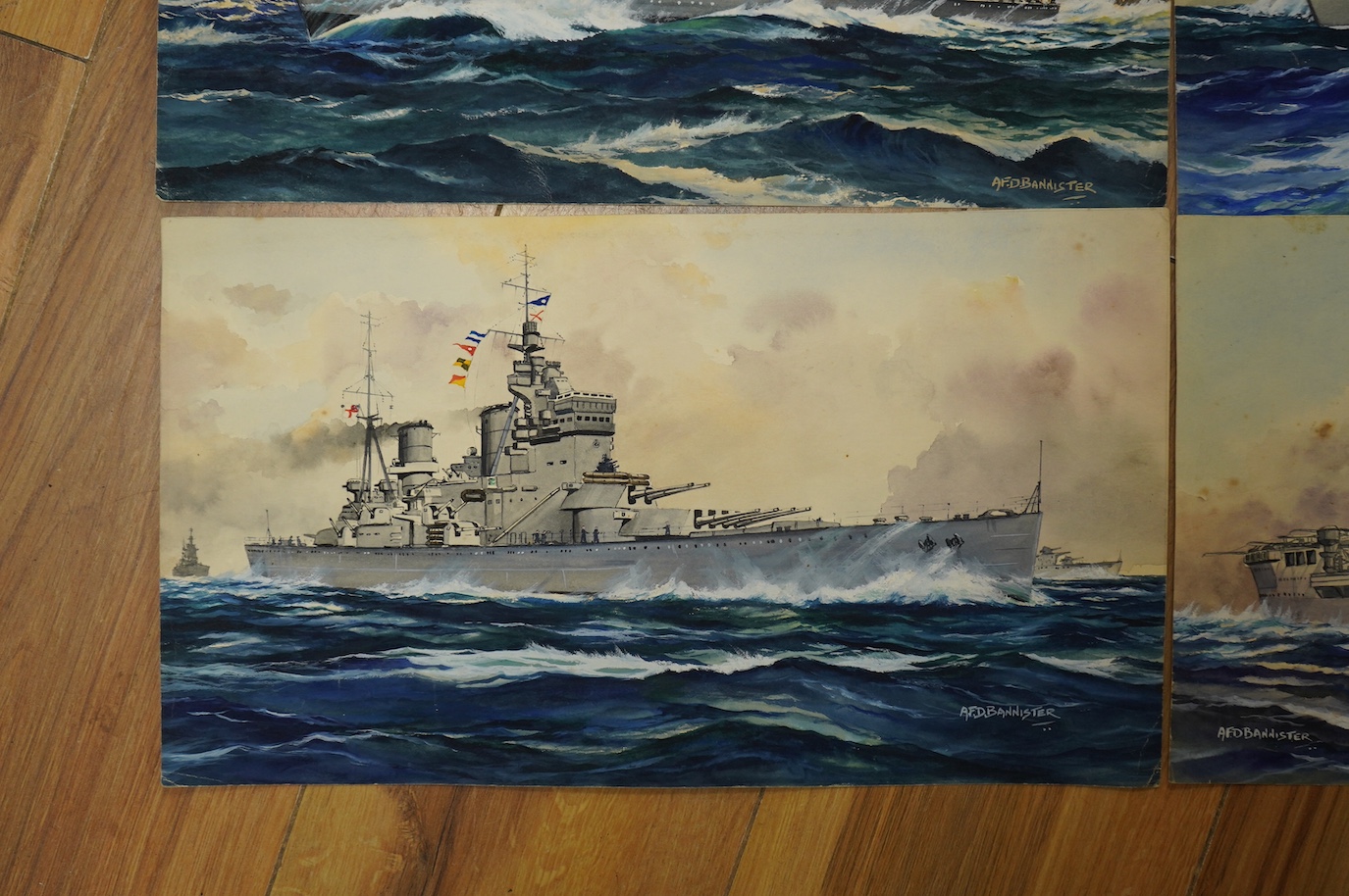 AFD Bannister, set of four original WWII watercolours for post card designs, Warships to include ‘HM Submarine Pandora’, ‘HMS Lightening Destroyer’ and ‘HMS Formidable Aircraft Carrier’, each signed with official censor